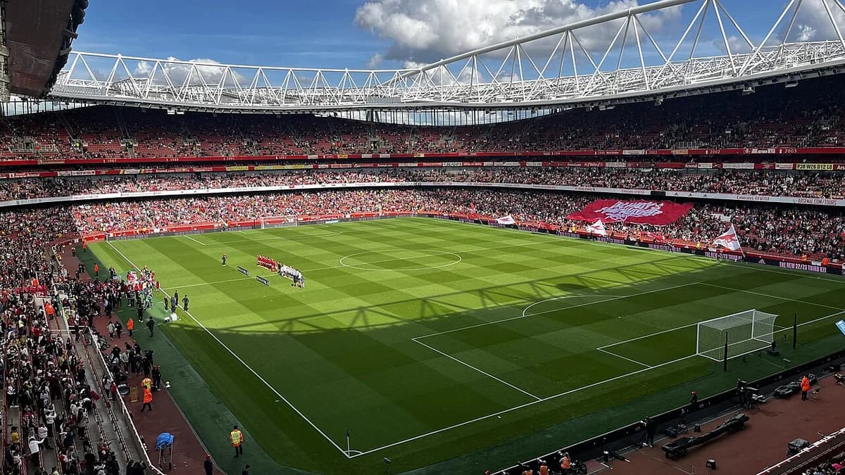 Wide view of a women’s football match at Emirates Stadium in London.