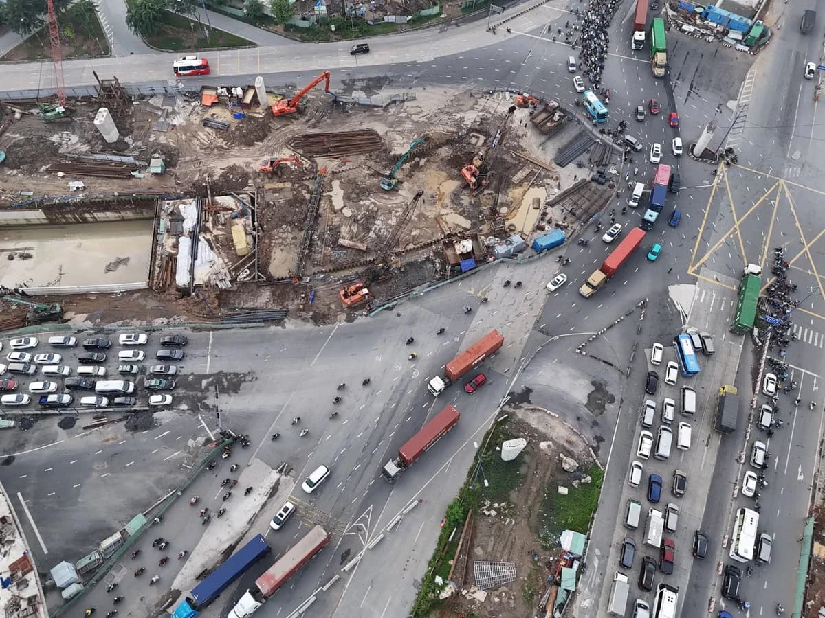 Aerial view of road construction and heavy traffic at a busy city intersection