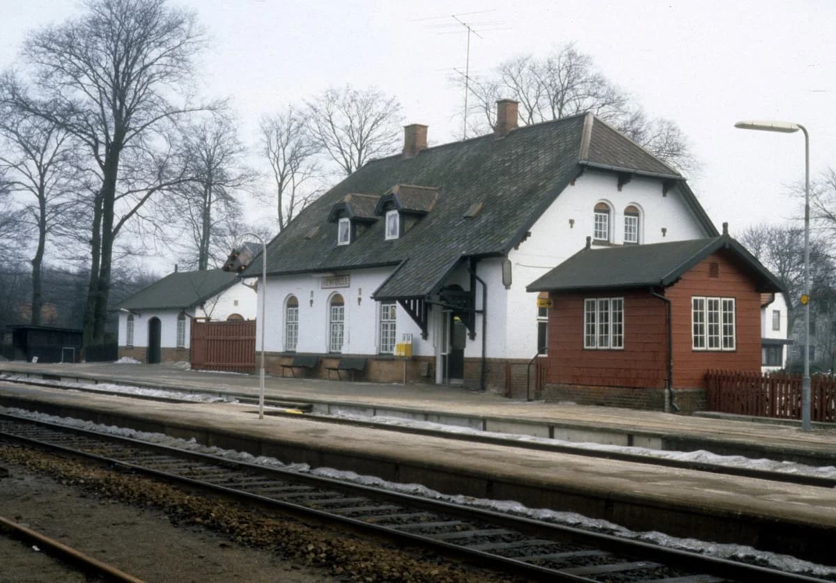Winter view of Herfølge railway station building and platforms.
